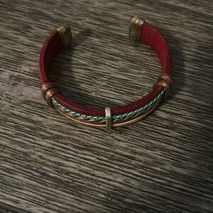 Handmade leather and copper bracelet.